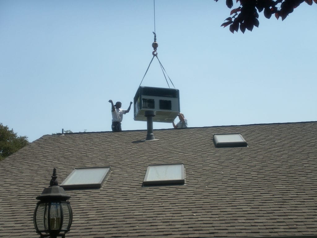 Installation crane lift for rooftop system