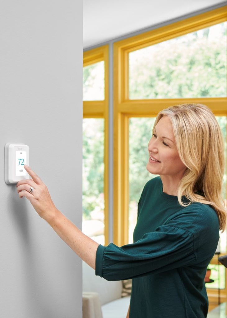 changing the temperature on a smart thermostat