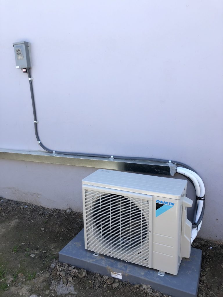 sunroom heating and cooling through a heat pump