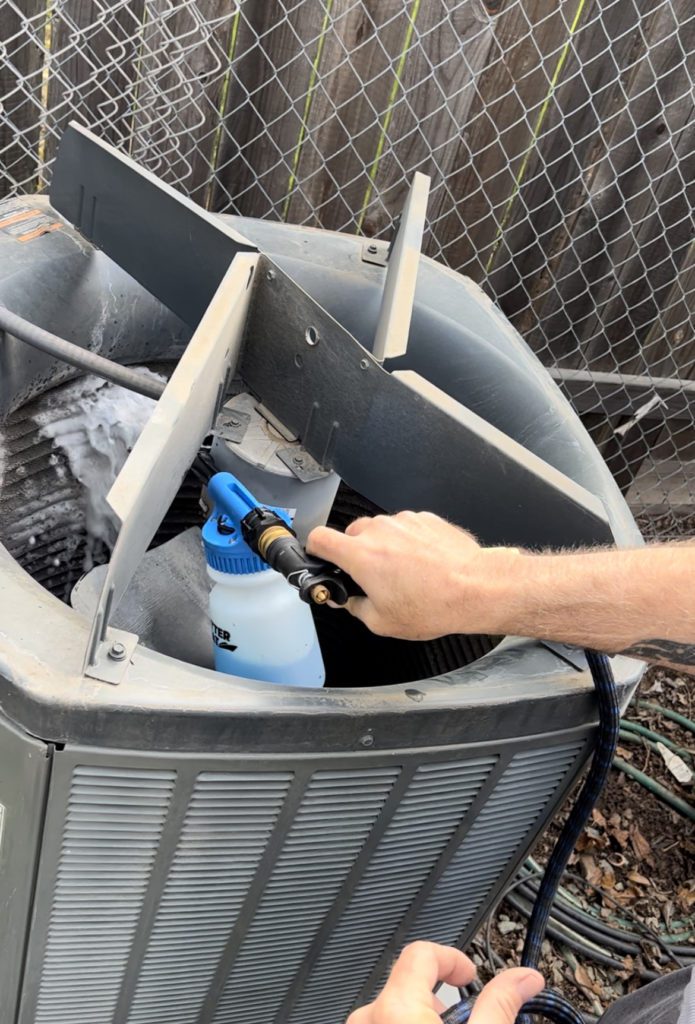 A/C maintenance and cleaning outdoor A/C unit in Sacramento